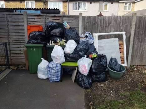 Bulk waste collection trucks on Eel Pie Island