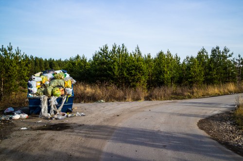 Residential bulk waste being loaded for collection