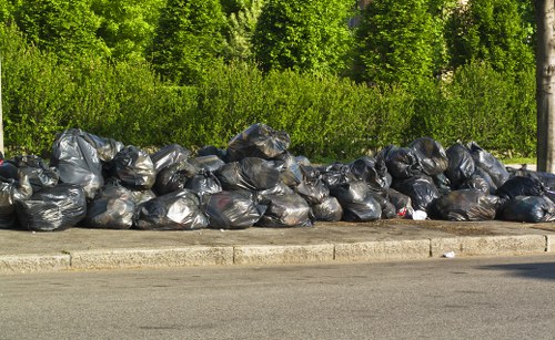 Construction debris being collected in Deptford